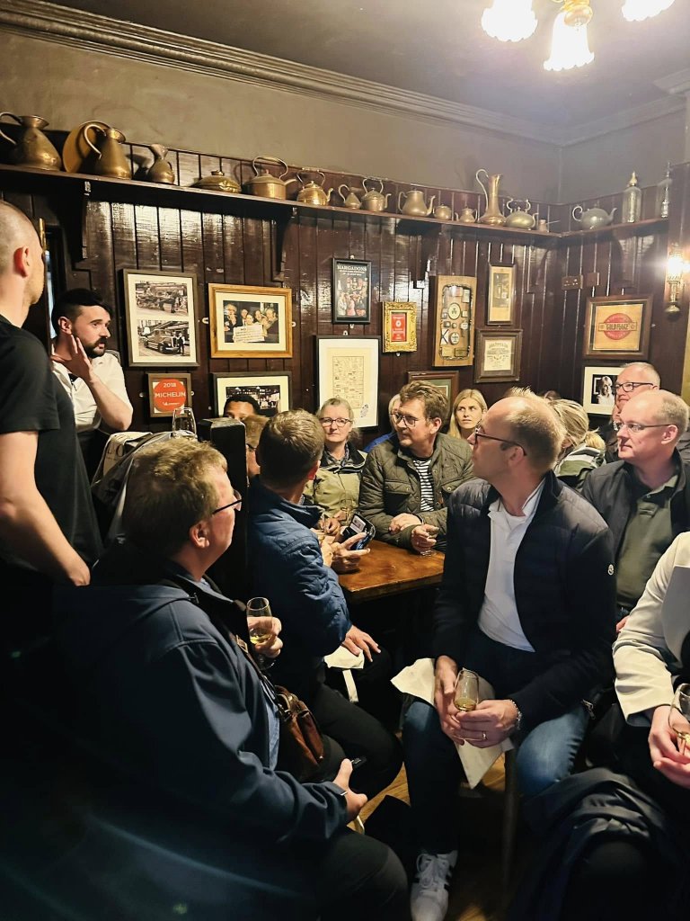 A group listening to a talk at Hargadons