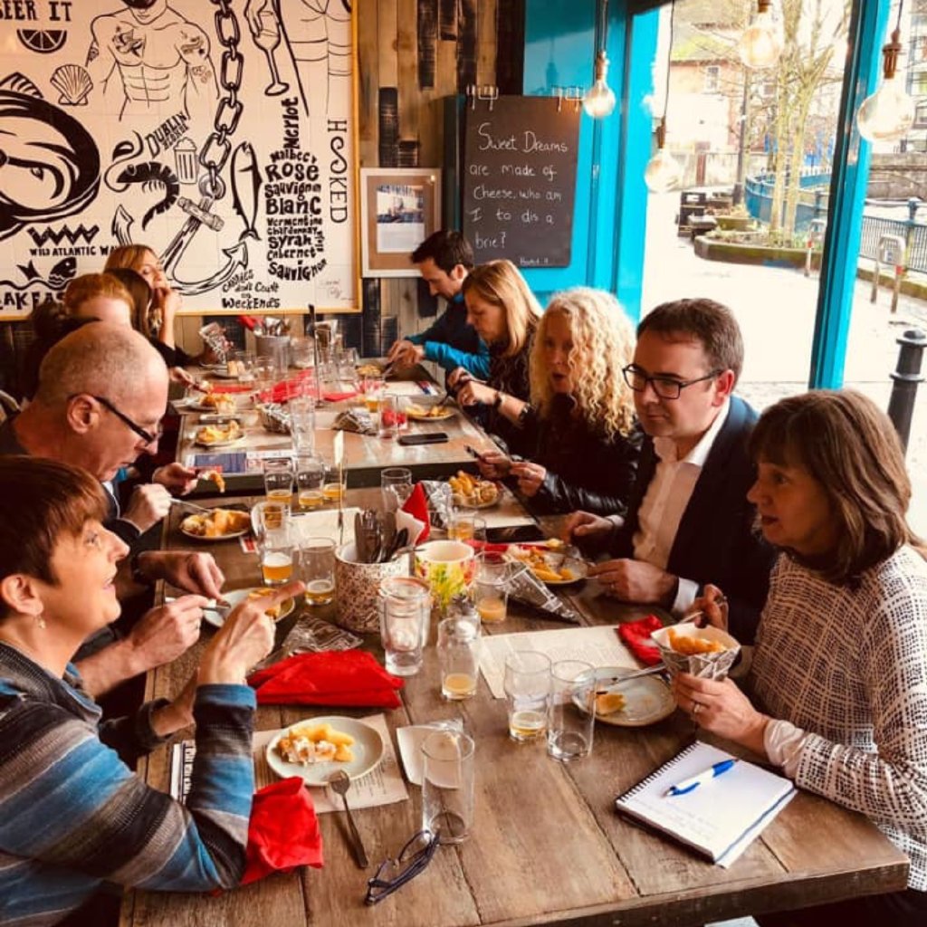 Group of people enjoying the sligo food tour at Hooked restaurant