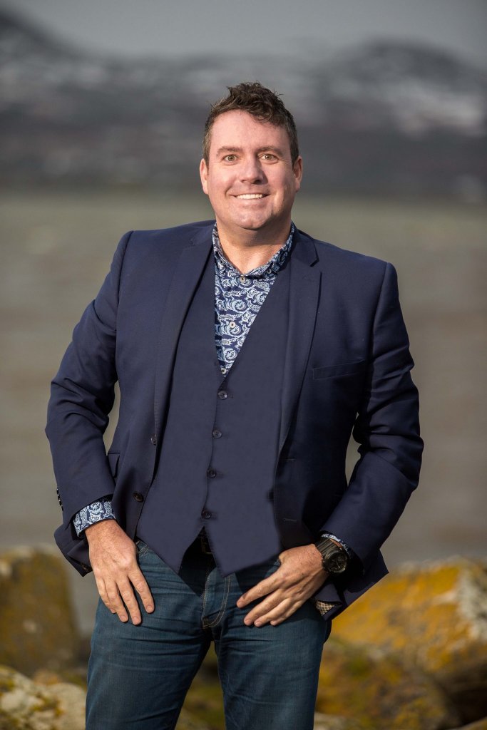 Anthony Gray dressed in a suit